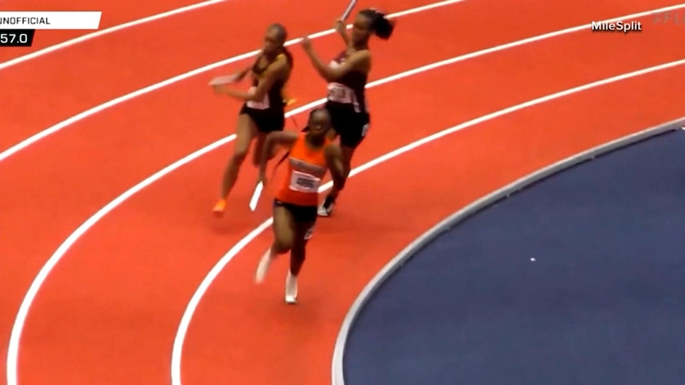 WATCH:  High school runner hit in head with baton during race